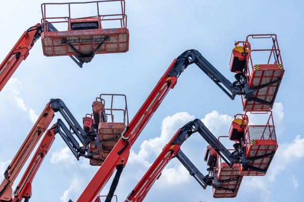  Powered access equipment in use at a building site which is being safely utilised through IPAF MEWP training.